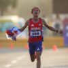 Dominicano Álvaro Abreu gana el oro y récord en la media maratón